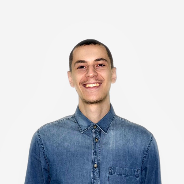 Professional headshot of Thoma Koli